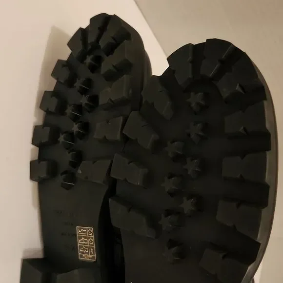 The Jimmy Choo Youth II Leather Boot features a leather upper, - Picture 12 of 14